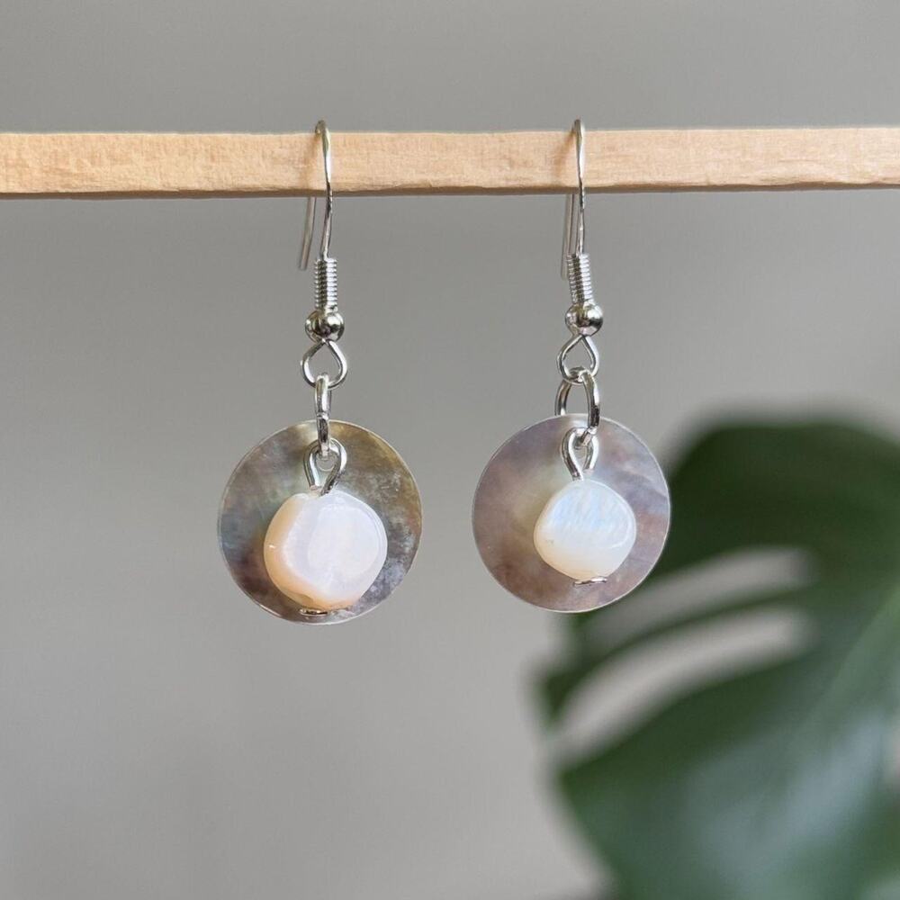 handmade earrings with mother of pearl discs and cream colored round beads